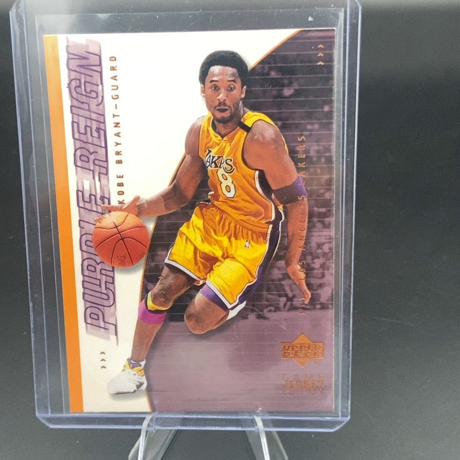 Kobe Bryant 2000-01 Upper Deck Purple Reign Jersey Card: This is a 2000-01 Upper Deck 'Purple Reign' trading card featuring Los Angeles Lakers legend Kobe Bryant. The card is a jersey edition insert, showcasing Kobe in his iconic number 8 jersey. It is