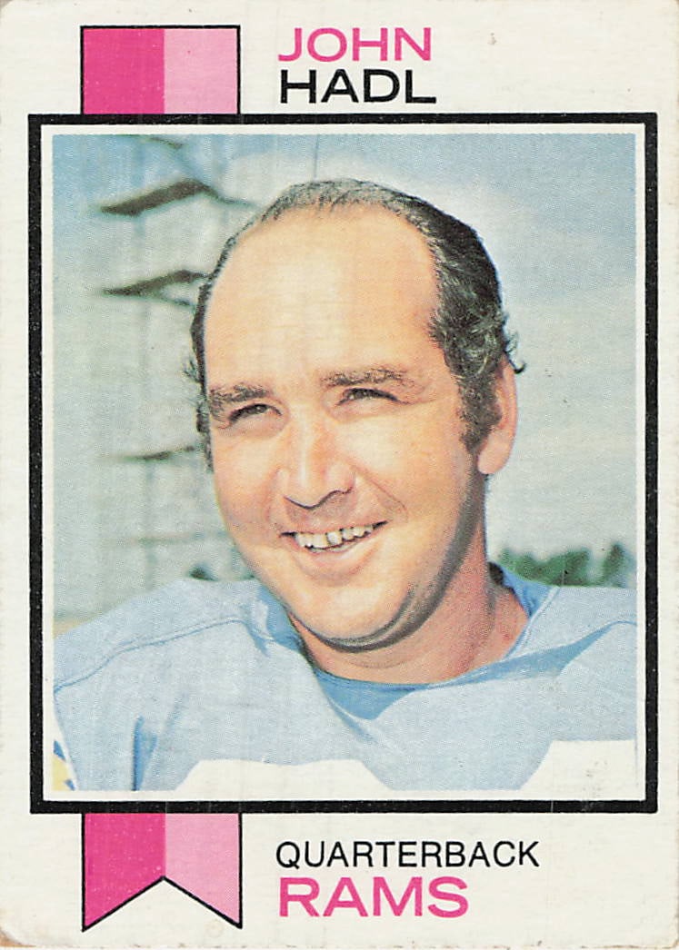 1973 Topps John Hadl #215 football trading card: 1973 Topps Football John Hadl #215 is a base trading card featuring John Hadl during his tenure with the Los Angeles Rams. Part of Topps' colorful early-1970s NFL release, this card features the