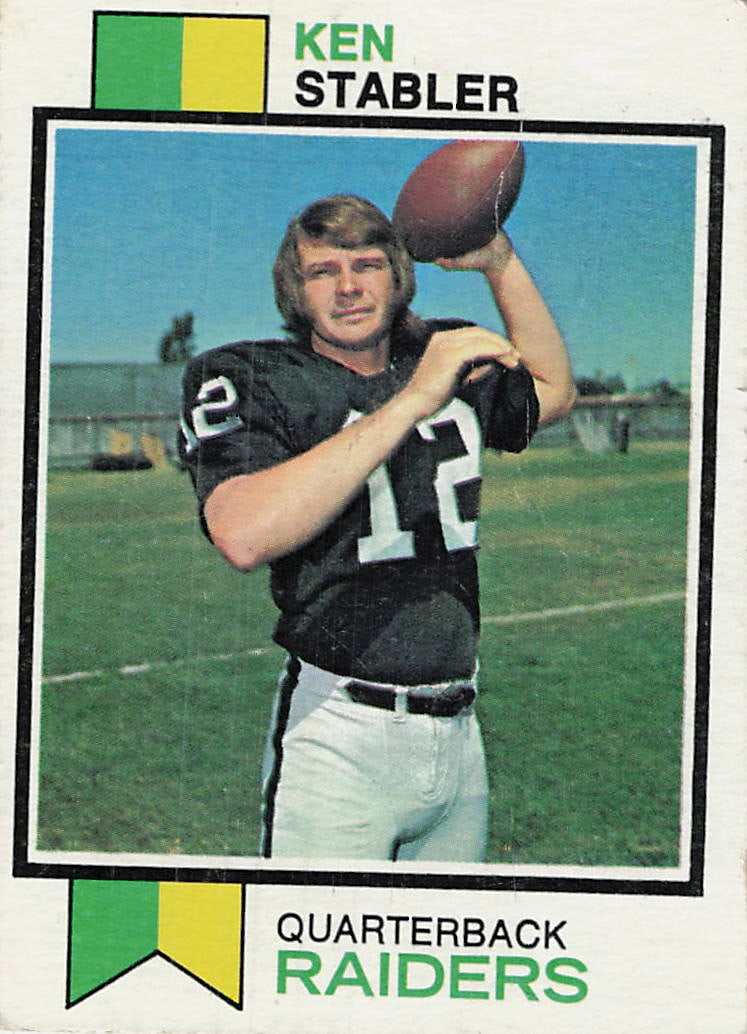1973 Topps Ken Stabler Rookie Card (#487): 1973 Topps Football Ken Stabler #487 is a rookie trading card featuring Ken Stabler during his tenure with the Oakland Raiders. Issued in Topps' 1973 football release, this vintage card is one of