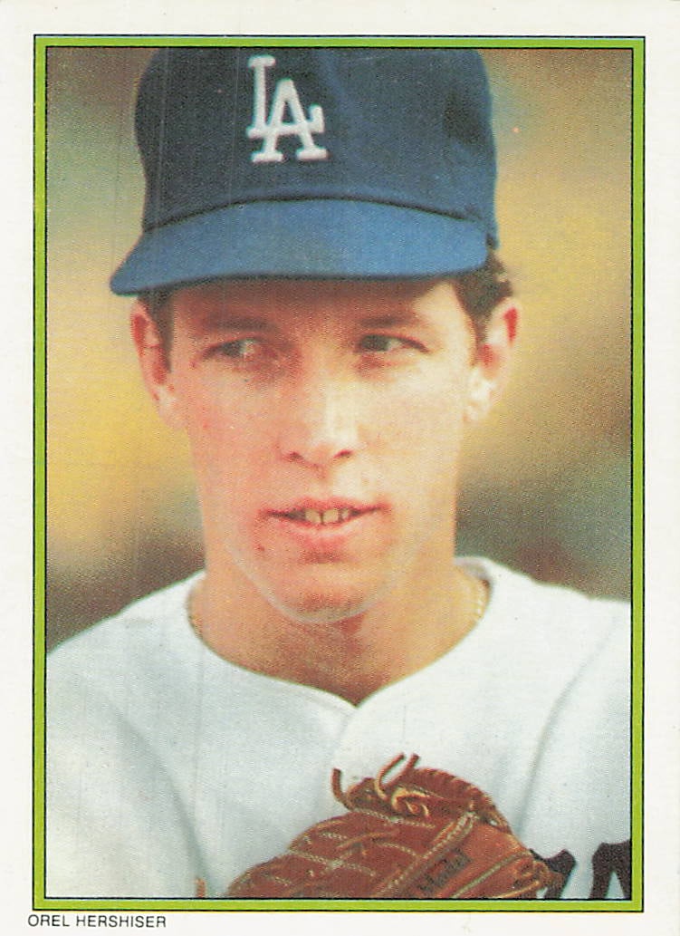 1986 Topps All Star Glossy Set of 60 Orel Hershiser #24: 1986 Topps 1986 All-Star Set Collector's Edition Orel Hershiser #24 is a base trading card featuring Orel Hershiser during his tenure with the Los Angeles Dodgers. This commemorative 60-card Topps rel