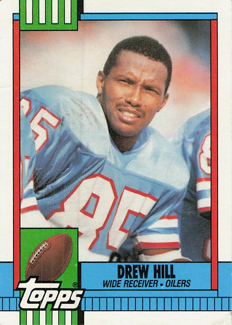 1990 Topps Drew Hill #217 football trading card: 1990 Topps Drew Hill #217 is a base trading card featuring Drew Hill during his tenure with the Houston Oilers. The 1990 Topps football release is a staple of the Junk Wax era, and Hill appears here