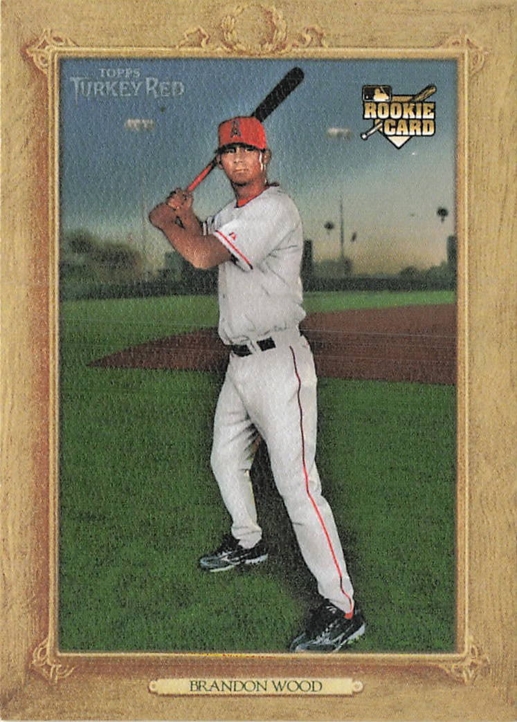 2007 Topps Turkey Red #52 Brandon Wood Rookie Card: 2007 Topps Turkey Red Brandon Wood #52 is a rookie trading card featuring Brandon Wood as a member of the Angels. Topps Turkey Red revives a classic vintage-style baseball card design, and this issue 