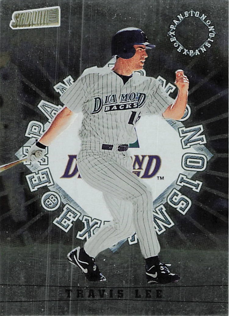 1998 Stadium Club #302 Travis Lee baseball card: This is a 1998 Stadium Club baseball card featuring Travis Lee, the first baseman who began his MLB career with the Arizona Diamondbacks. The card features the premium photography and classic design a