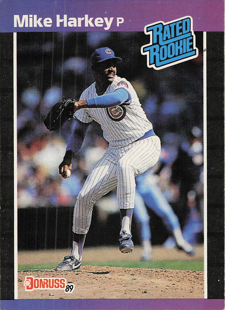 1989 Donruss #43 Mike Harkey Rated Rookie baseball card: This is a 1989 Donruss Rated Rookie baseball card featuring Mike Harkey, a pitcher who began his MLB career with the Chicago Cubs. The card features the classic 1989 Donruss design and highlights Hark