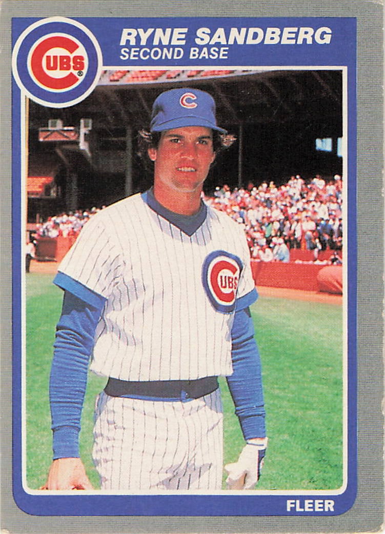 1985 Fleer Ryne Sandberg #65 baseball trading card: This is a 1985 Fleer baseball trading card featuring Ryne Sandberg of the Chicago Cubs. The card highlights Sandberg during his early MLB career and features the classic 1985 Fleer design from the