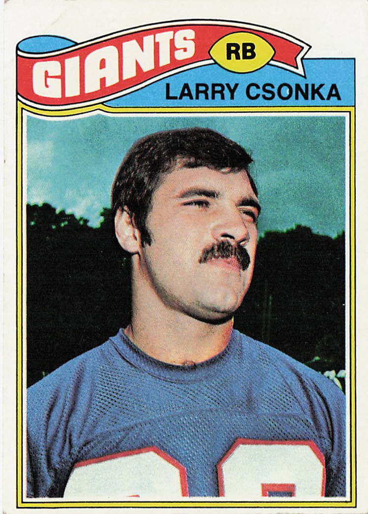 1977 Topps Larry Csonka #505 football trading card: This is a 1977 Topps football trading card featuring Larry Csonka, the legendary fullback known for his time with the Miami Dolphins. The card highlights Csonka during his NFL career and features the