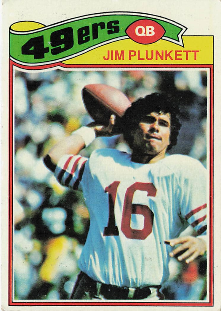 1977 Topps Jim Plunkett #331 football trading card: This is a 1977 Topps football trading card featuring Jim Plunkett, the former quarterback known for his time with the New England Patriots and Oakland Raiders. The card highlights Plunkett during his