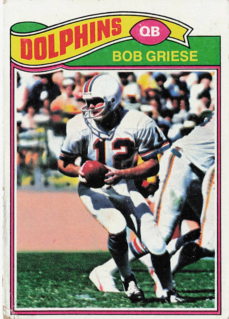 1977 Topps Bob Griese #515 football card: This is a 1977 Topps football card featuring Bob Griese of the Miami Dolphins. The card highlights Griese, a standout quarterback and key figure in Dolphins history, and features the classic 1977