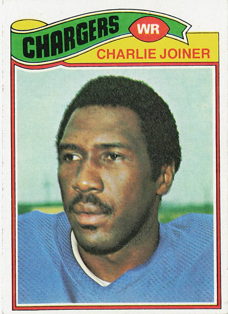 1977 Topps Charlie Joiner #167 football card: This is a 1977 Topps football card featuring Charlie Joiner of the San Diego Chargers. The card highlights Joiner during his successful NFL career as a wide receiver and features the classic 1977