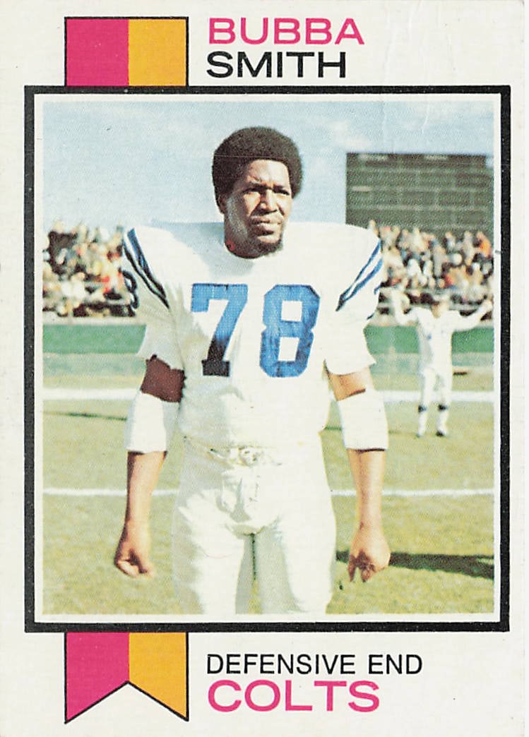 1973 Topps #155 Bubba Smith football trading card: This is a 1973 Topps football trading card featuring Bubba Smith, the standout defensive lineman known for his time with the Baltimore Colts. The card highlights Smith during his NFL career and