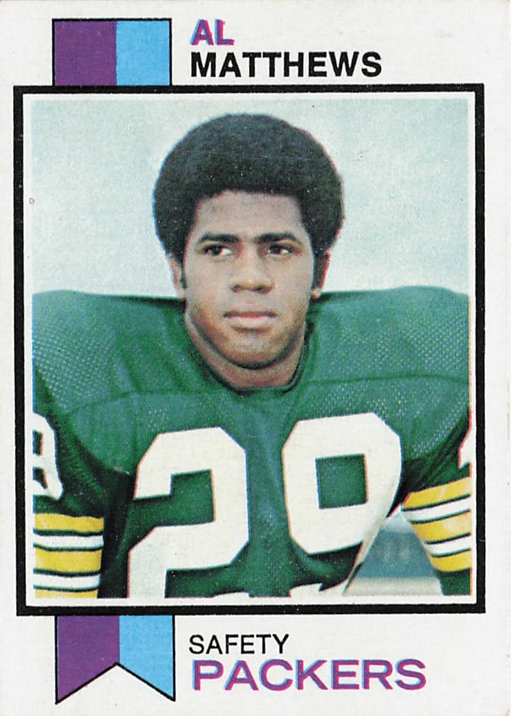 1973 Topps Al Matthews Rookie Card #143: This is a 1973 Topps rookie football card featuring Al Matthews, a defensive player known for his NFL career with the Cleveland Browns. The card highlights Matthews early in his professional career