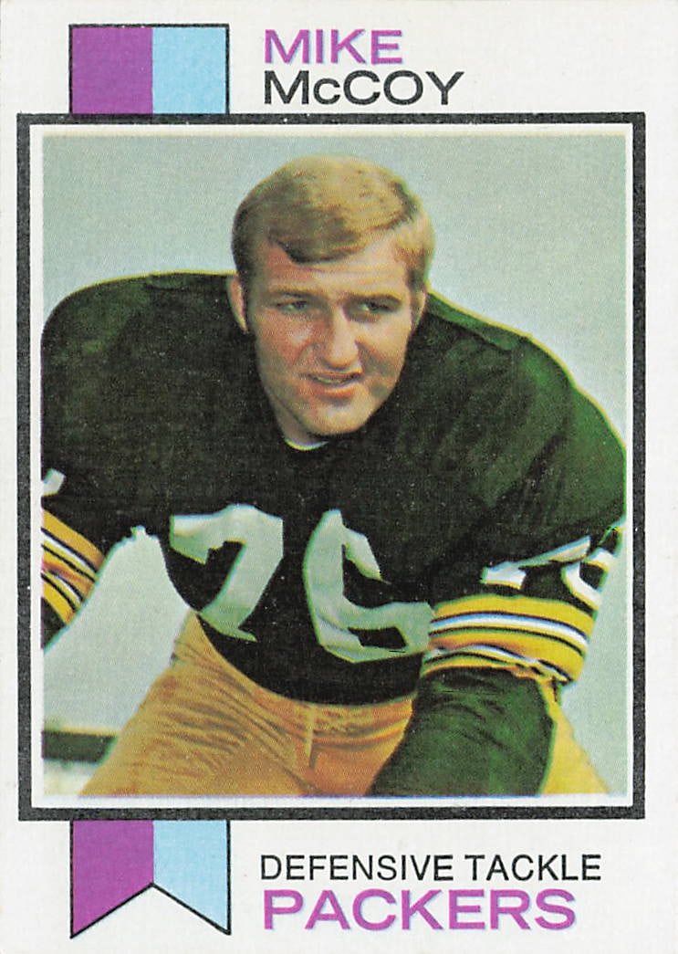 1973 Topps #296 Mike McCoy Packers: This is a 1973 Topps football card featuring Mike McCoy of the Green Bay Packers. The card highlights McCoy during his NFL career and features the classic 1973 Topps design from the 1970s football