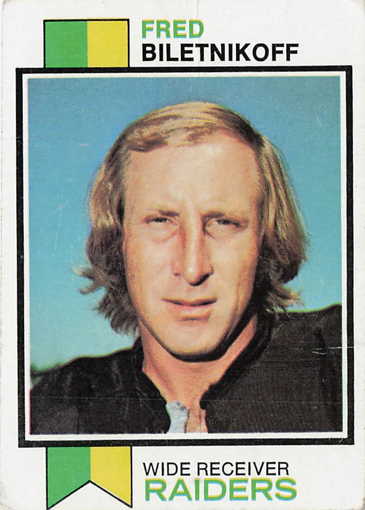 1973 Topps Fred Biletnikoff #320 Oakland Raiders Football Card: This is a 1973 Topps football trading card featuring Fred Biletnikoff of the Oakland Raiders. The card highlights the Hall of Fame wide receiver during his standout NFL career and features the