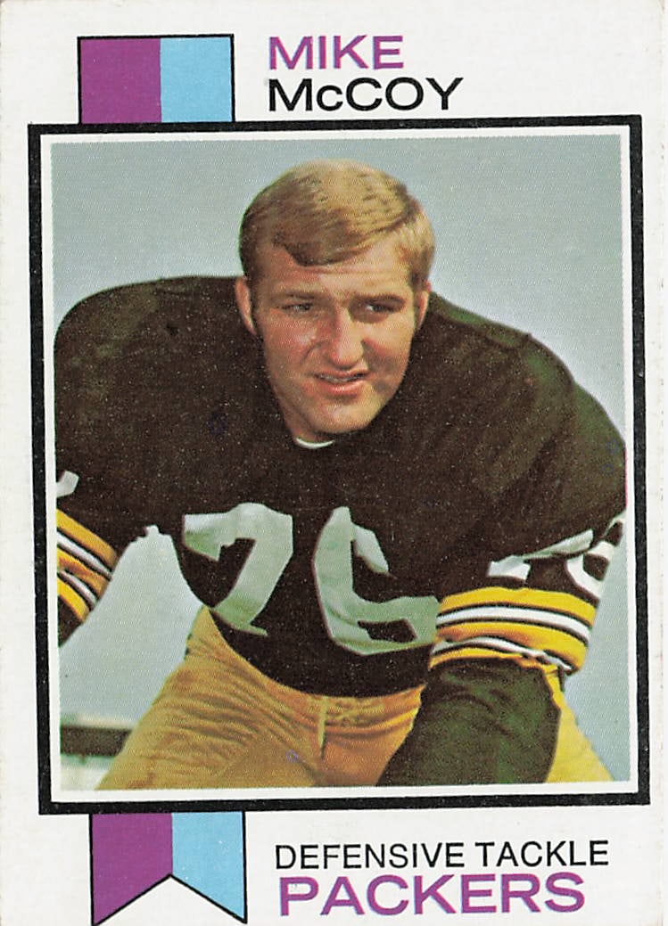 1973 Topps #296 Mike McCoy football trading card: This is a 1973 Topps football trading card featuring Mike McCoy of the Green Bay Packers. The card highlights McCoy during his NFL career and features the classic 1973 Topps design from the 1970s
