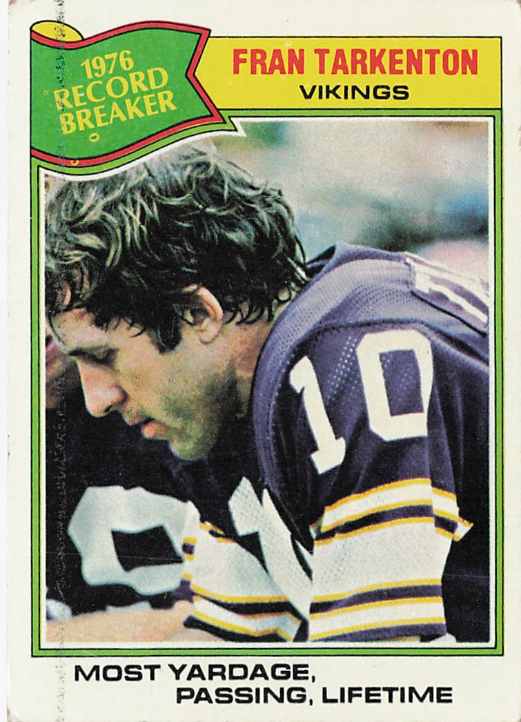 1977 Topps #454 Fran Tarkenton football card: This is a 1977 Topps football card featuring Fran Tarkenton of the Minnesota Vikings. The card highlights the Hall of Fame quarterback during his NFL career and features the classic 1977 Topps design 