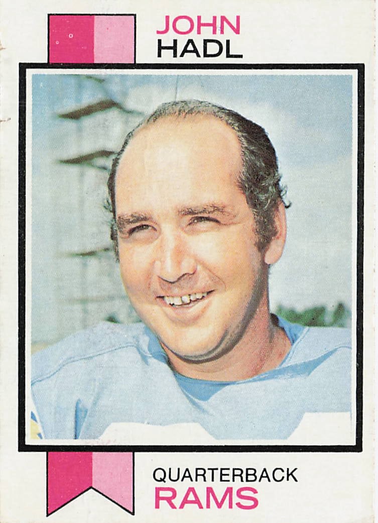 1973 Topps #215 John Hadl football trading card: This is a 1973 Topps football trading card featuring John Hadl, the standout quarterback known for his time with the San Diego Chargers and Los Angeles Rams. The card highlights Hadl during his NFL ca
