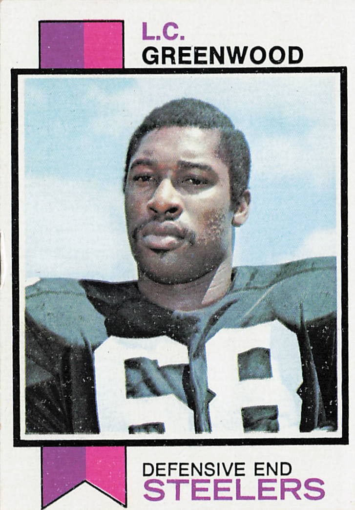 1973 Topps # 165 L.C. Greenwood: This is a 1973 Topps football trading card featuring L.C. Greenwood of the Pittsburgh Steelers. The card highlights Greenwood, a standout defensive end and key member of the Steelers' famed defense, a