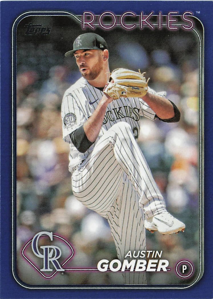 2024 Topps Royal Blue Austin Gomber #340 baseball car: This retail-exclusive card features starting pitcher Austin Gomber in his home pinstripe uniform delivering a pitch for the Colorado Rockies. This specific card is the Royal Blue parallel, a distinct