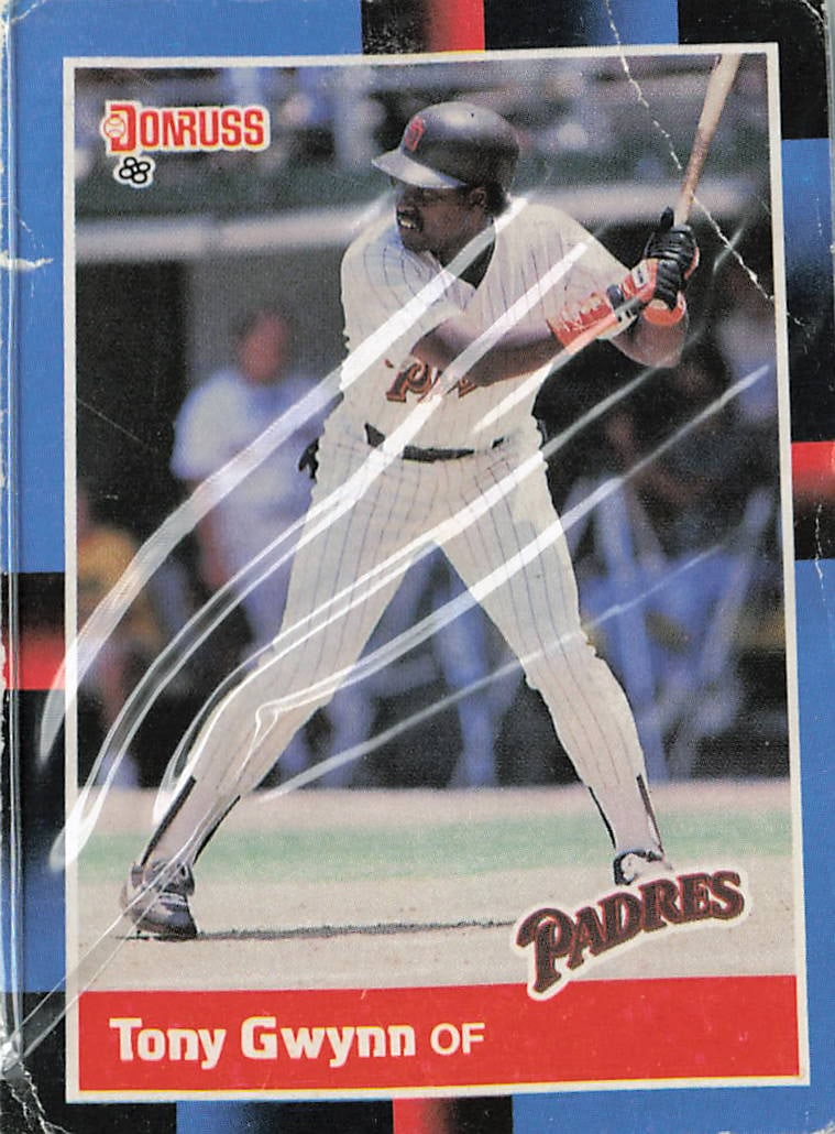 1988 Donruss Tony Gwynn #164 baseball card: This vintage card captures Hall of Fame legendary pure hitter Tony Gwynn locked into his signature batting stance for the San Diego Padres during the prime of his storied career. The 1988 Donruss