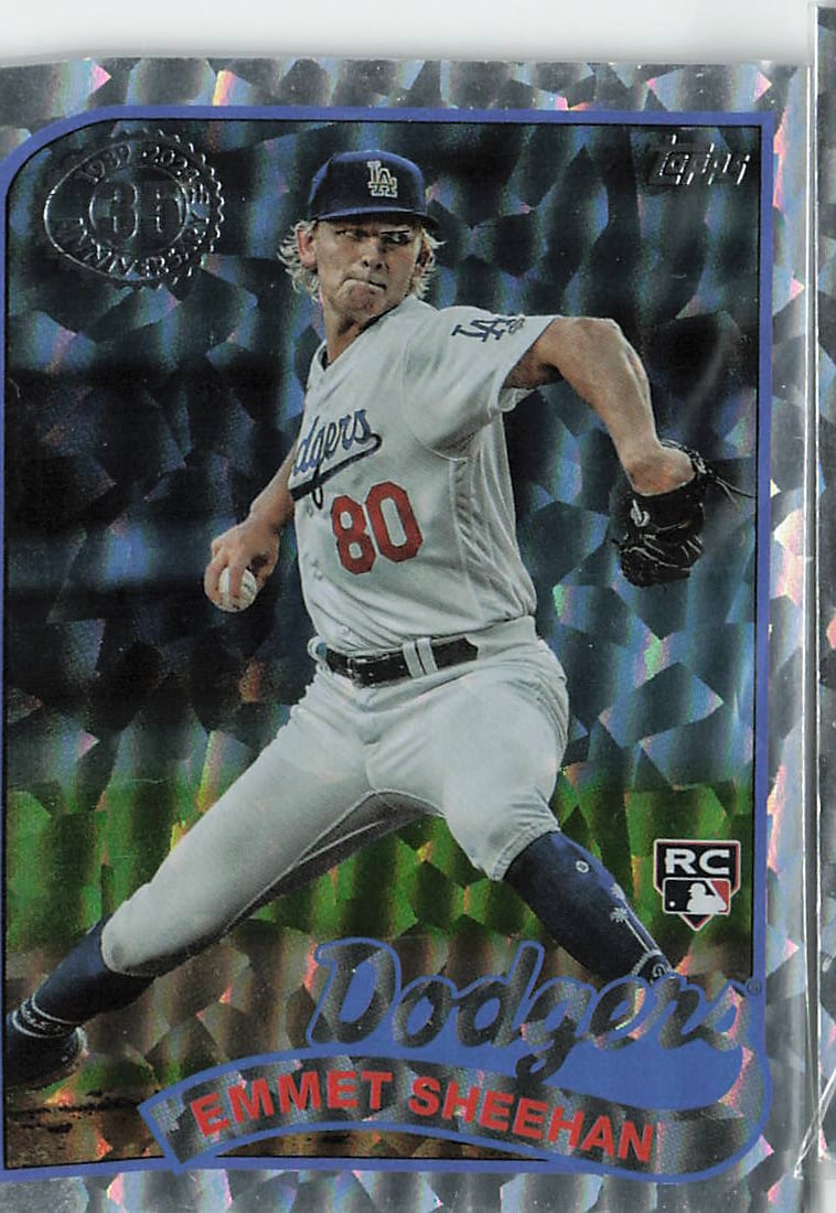 2024 Topps 1989 Chrome Silver Pack Mojo Refractor Emmet Sheehan #T89C-38 rookie card: This premium insert card highlights young starting pitcher Emmet Sheehan in his road gray uniform delivering a pitch on the mound for the Los Angeles Dodgers. It features a true rookie card status,