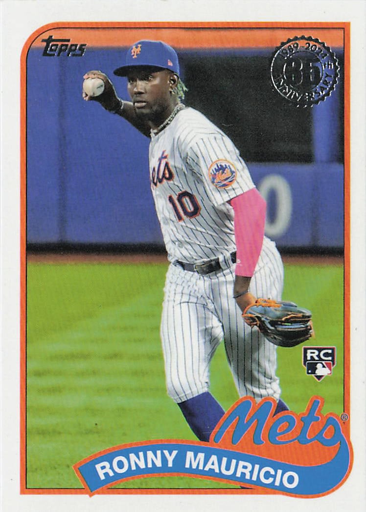 2024 Topps 1989 Baseball 35th Anniversary Ronny Mauricio #89B-93 rookie insert card.: This throwback insert captures talented infielder Ronny Mauricio fields a grounder in his pinstripe home uniform for the New York Mets. Part of the 35th Anniversary checklist featured heavily inside