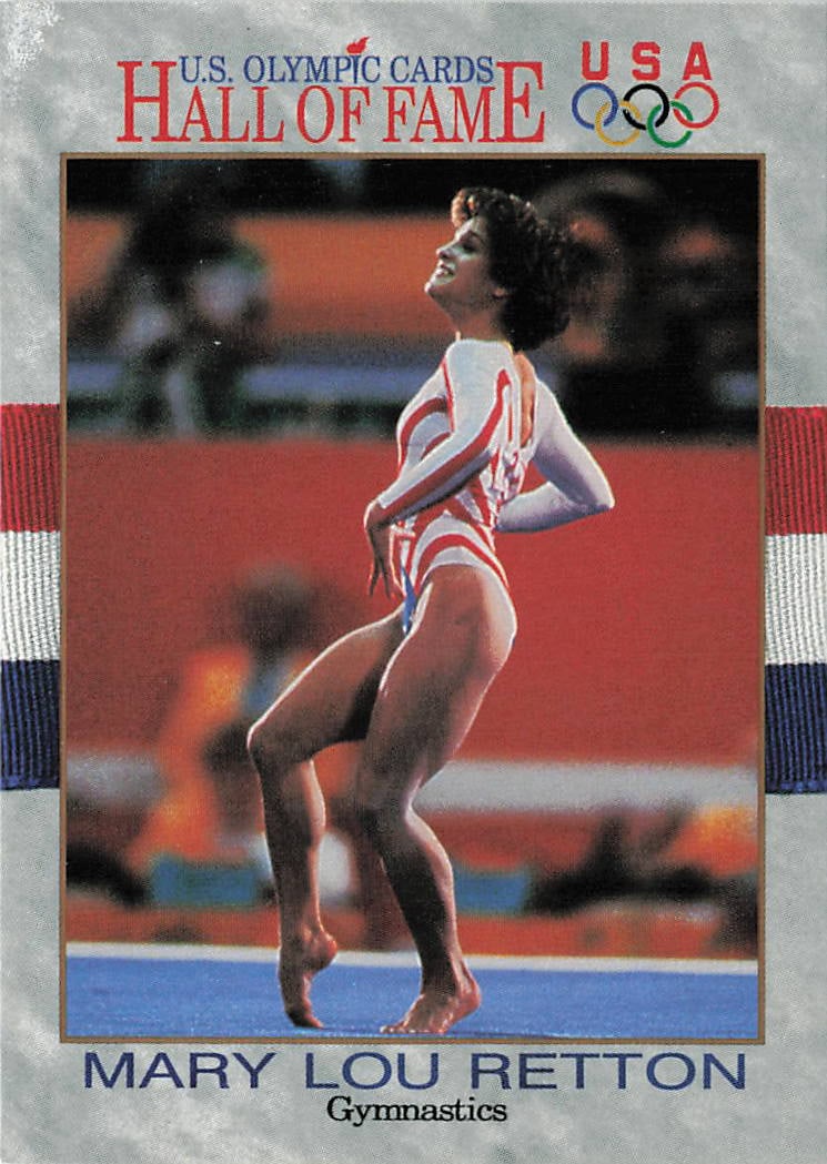 1991 Impel U.S. Olympic Hall of Fame Mary Lou Retton #27 trading card: The 1991 Impel U.S. Olympic Hall of Fame Mary Lou Retton #27 trading card features a gray stone-textured border framing an action photo of the legendary gymnast smiling mid-routine in her iconic red,