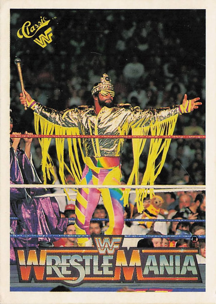 1990 Classic WWF trading card featuring "Macho King" Randy Savage at WrestleMania VI: The 1990 Classic WWF "The History of WrestleMania" 'Macho King' Randy Savage #123 trading card captures a classic moment of showmanship from the WWE Hall of Famer Randy Savage during his grand