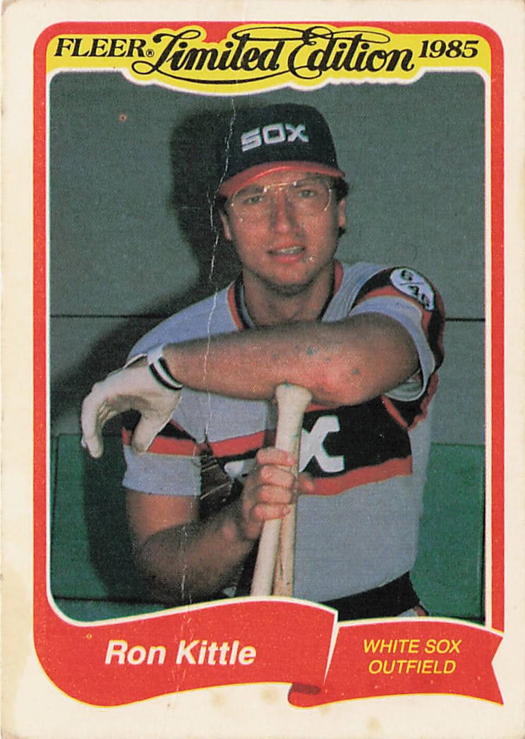 1985 Fleer Limited Edition Ron Kittle #16: The 1985 Fleer Limited Edition Ron Kittle #16 is a vintage baseball card manufactured by Fleer Corporation that showcases the powerful Chicago White Sox slugger leaning over a dugout railing while