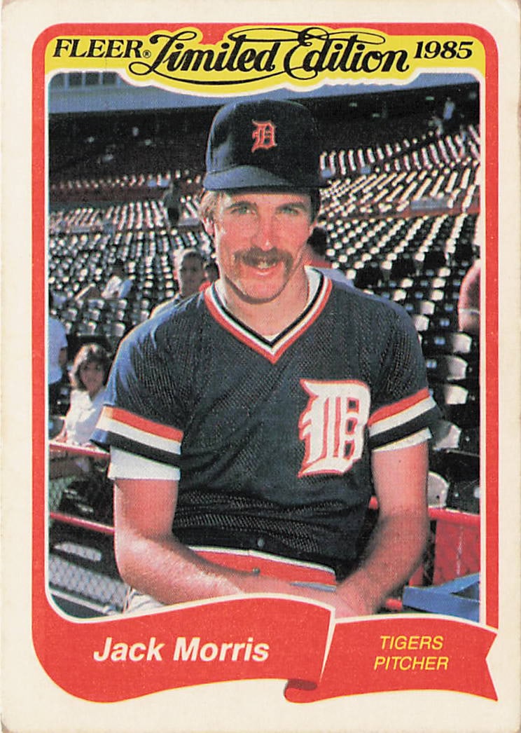 1985 Fleer Limited Edition baseball trading card: The 1985 Fleer Limited Edition Jack Morris #20 is a vintage baseball card manufactured by Fleer Corporation that features a smiling portrait of the Hall of Fame ace pitcher sitting in the dugout in