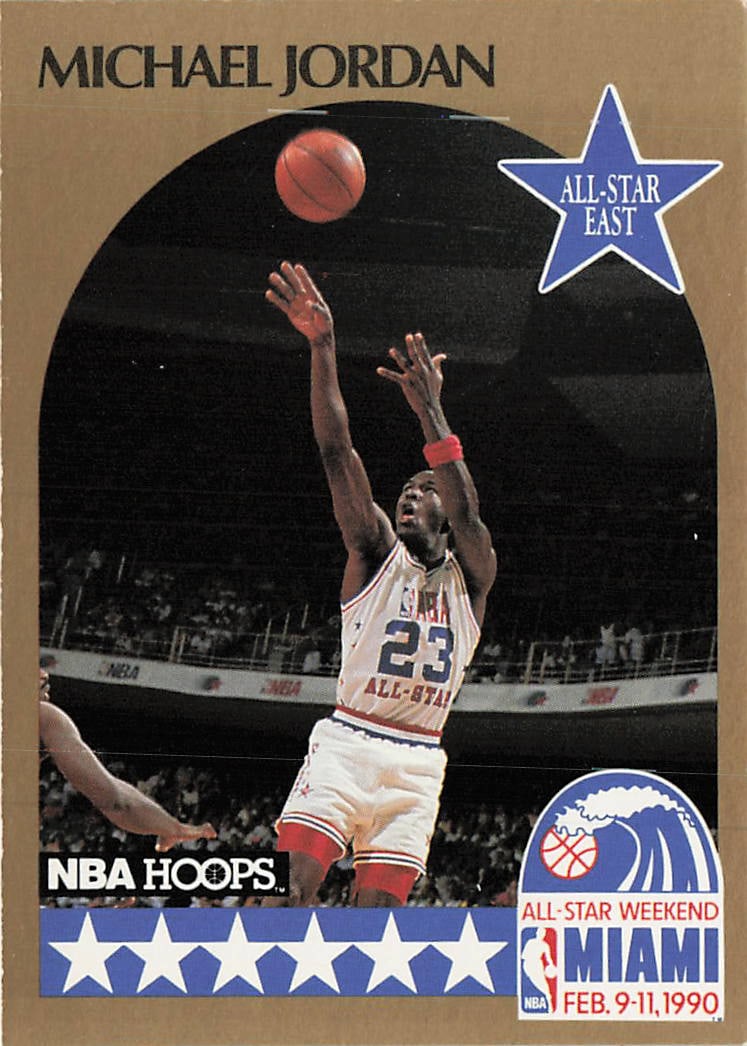 1990-91 NBA Hoops Michael Jordan All-Star East #5: The 1990-91 NBA Hoops Michael Jordan All-Star East #5 basketball card commemorates "His Airness" participating in the historic 1990 NBA All-Star Weekend hosted in Miami. Breaking away from standard pl