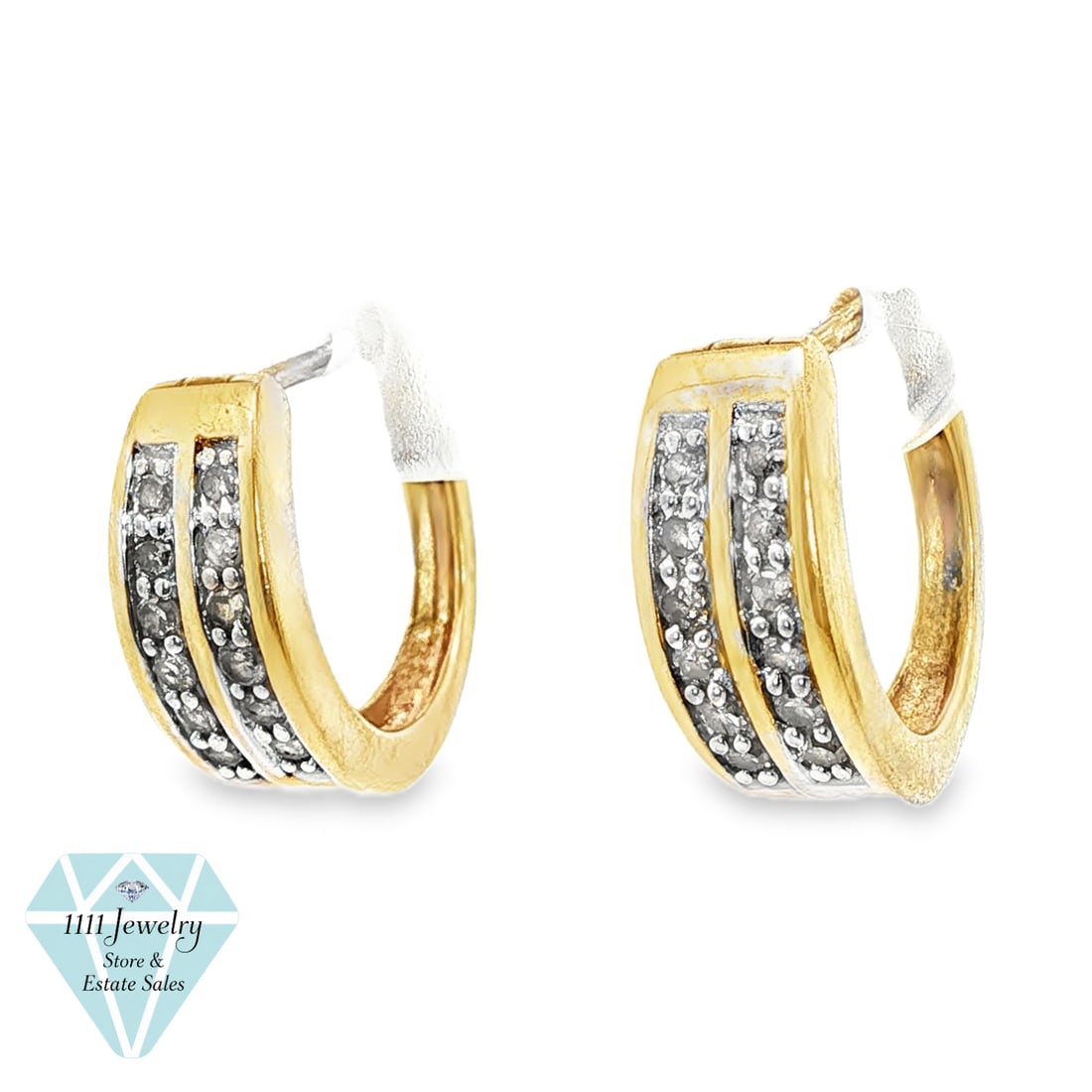 10K Yellow Gold 0.24 CTW Diamond Double-Row Hoop Earrings: Title: 10K Yellow Gold 0.24 CTW Diamond Double-Row Hoop Earrings Description: Pair of unbranded 10K yellow gold hinged hoop earrings with two contrasting white-tone diamond channels across each front.