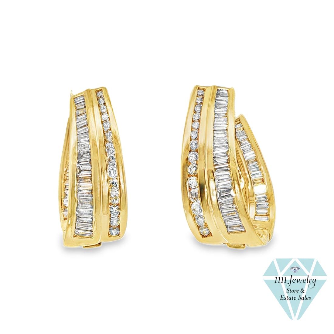 14K Yellow Gold 2.48 CTW Round & Baguette Diamond Hoop Earrings: Title: 14K Yellow Gold 2.48 CTW Round & Baguette Diamond Hoop Earrings Description: Pair of sculptural double-row hoop earrings crafted in 14K yellow gold, with hinged wire closures. The pair is set w