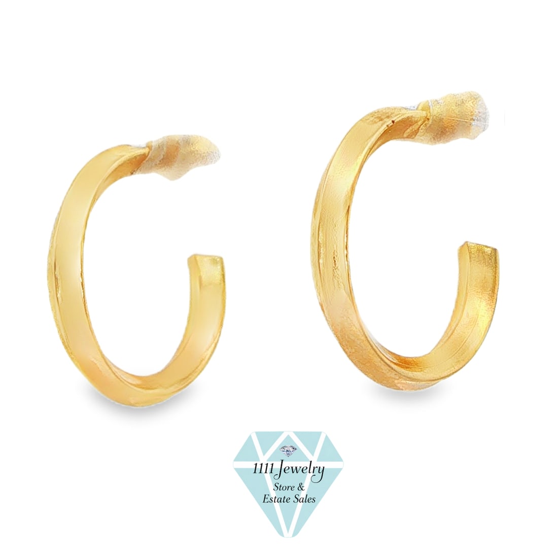 Designer-Signed CCC 14K Yellow Gold Small Hoop Earrings: Title: Designer-Signed CCC 14K Yellow Gold Small Hoop Earrings Description: Pair of small open hoop earrings crafted in 14K yellow gold with a sculpted ridged profile, squared open ends, straight post