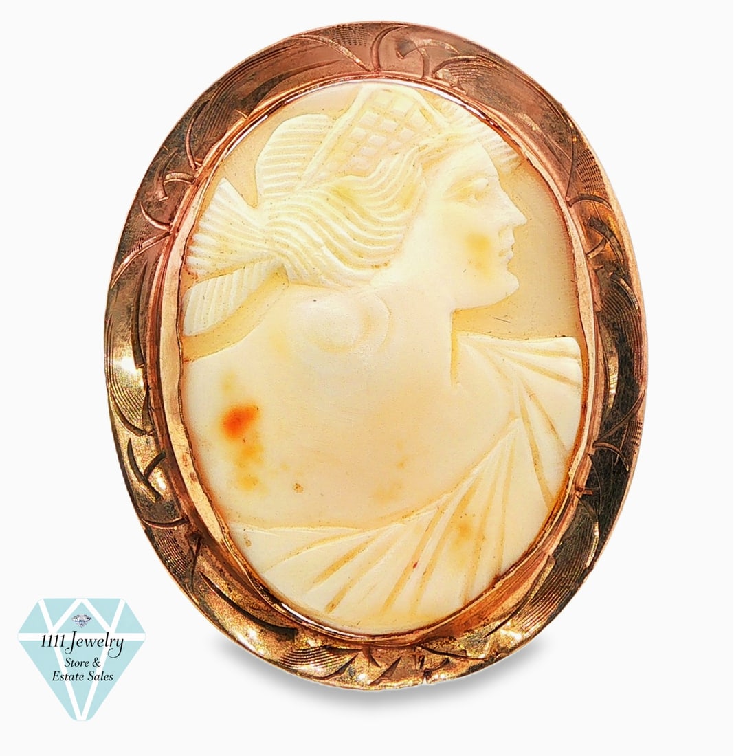 Antique 10K Rose Gold Hand-Carved Shell Cameo Portrait Brooch: Title: Antique 10K Rose Gold Hand-Carved Shell Cameo Portrait Brooch Description: Antique oval brooch centered by a cream and peach-toned shell cameo carved in relief with a right-facing classical fem