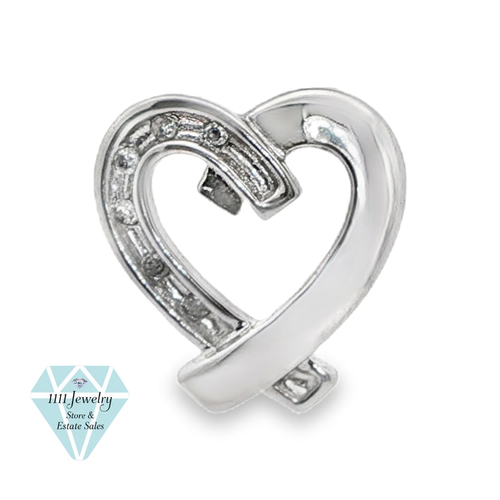 Designer-Signed D 10K White Gold Diamond Accent Open Heart Pendant: Title: Designer-Signed D 10K White Gold Diamond Accent Open Heart Pendant Description: Ribbon-inspired open heart pendant crafted in 10K white gold and accented with six round-cut diamonds. The polish