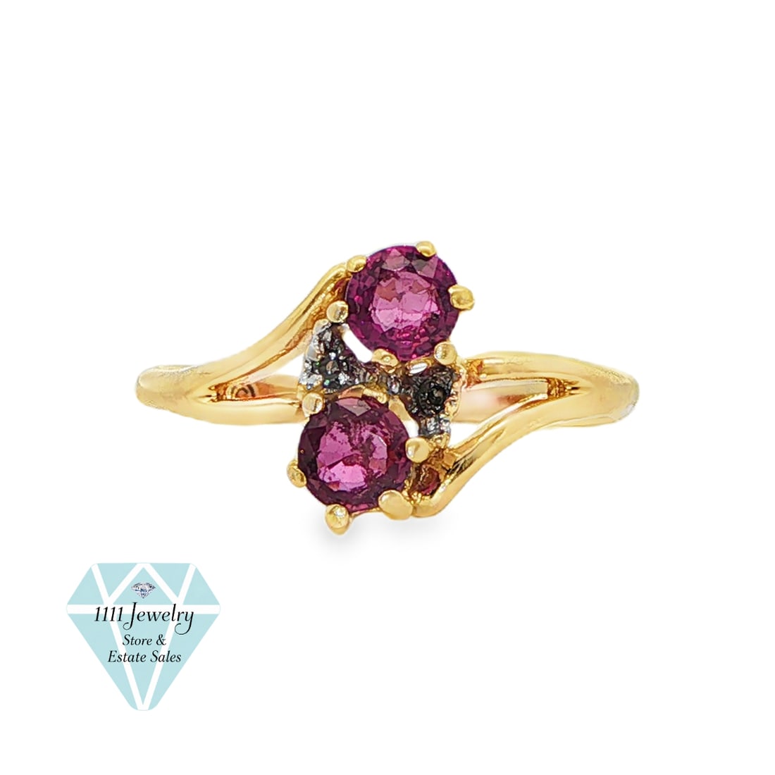 Designer Signed IB 14K Yellow Gold Ruby & Diamond Bypass Ring, Size 5: Title: Designer Signed IB 14K Yellow Gold .50 CTW Ruby & Diamond Ring, Size 5 Description: Designer-signed two-stone bypass ring crafted in 14K yellow gold. Two round-cut rubies are prong set at oppos