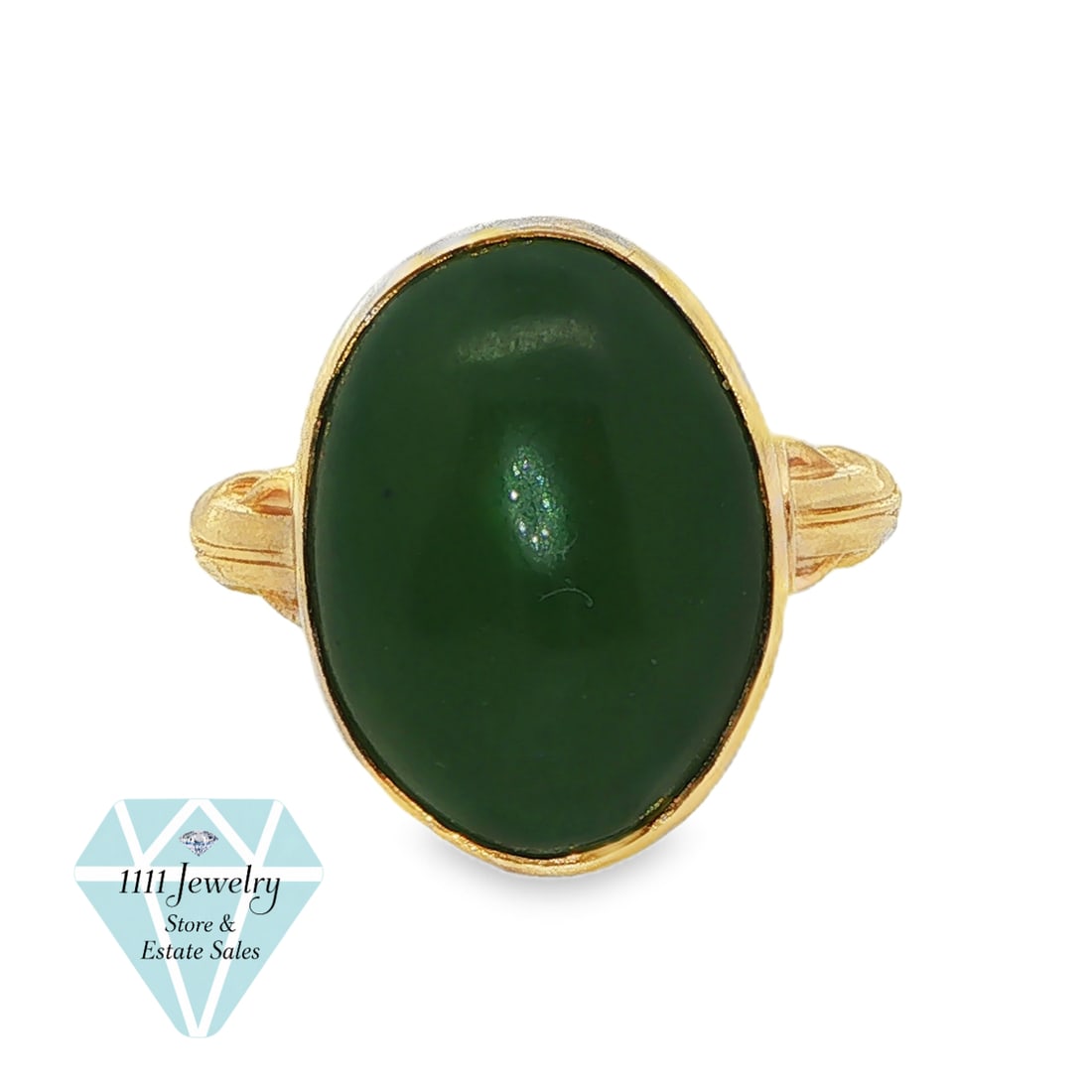 10K Gold 14.43 CT Oval Nephrite Jade Cabochon Ring Size 6.5: Title: 10K Gold 14.43 CT Oval Nephrite Jade Cabochon Ring Size 6.5 Description: 10K yellow-gold ring centered by a large oval green nephrite jade cabochon, approximately 18 mm x 14 mm x 6.5 mm and 14.