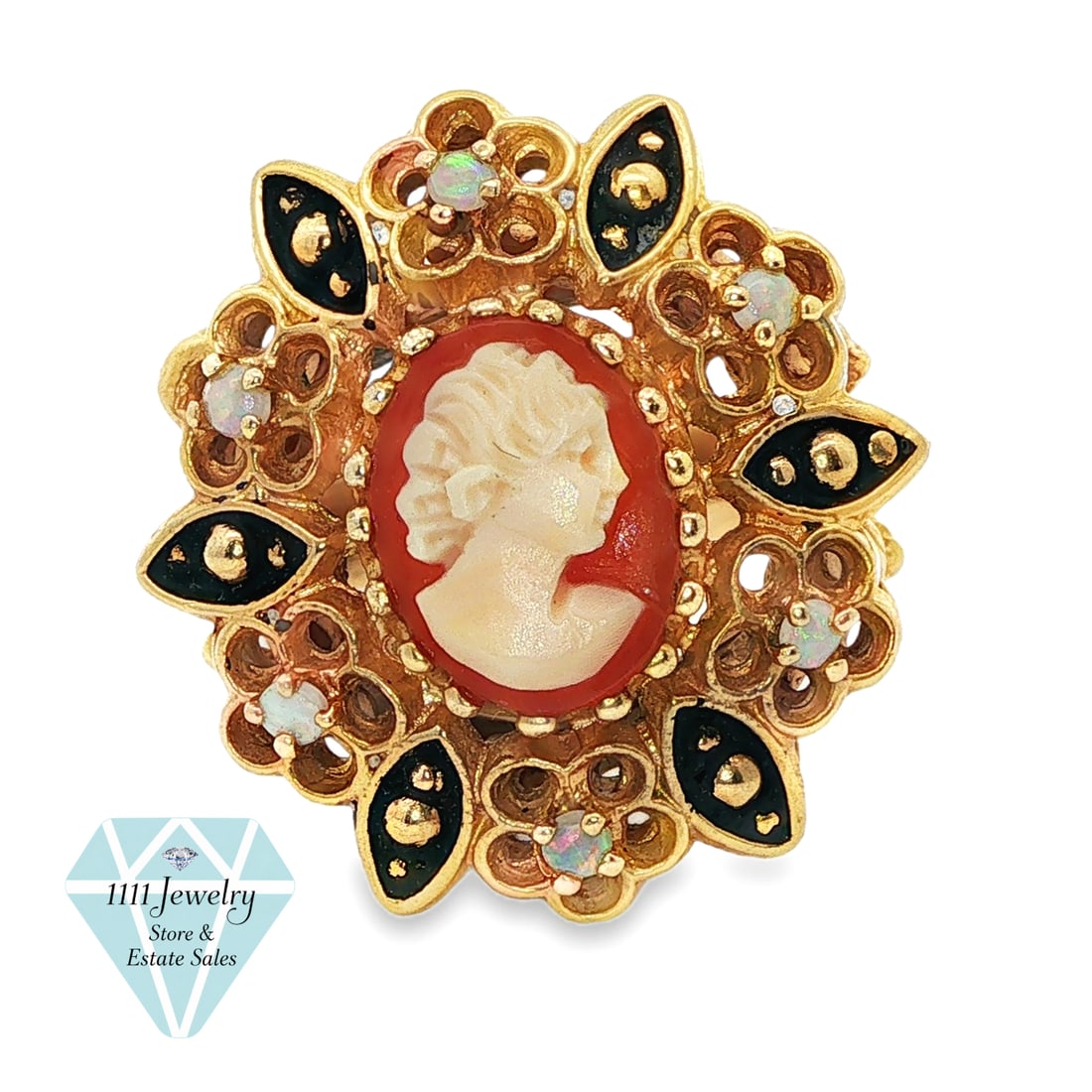 Rada 14K Yellow Gold Shell Cameo, Opal & Black Enamel Ring: Title: Rada 14K Yellow Gold Shell Cameo, Opal & Black Enamel Ring Description: Designer-signed Rada statement ring crafted in 14K yellow gold. The large pierced openwork face centers an oval carved sh