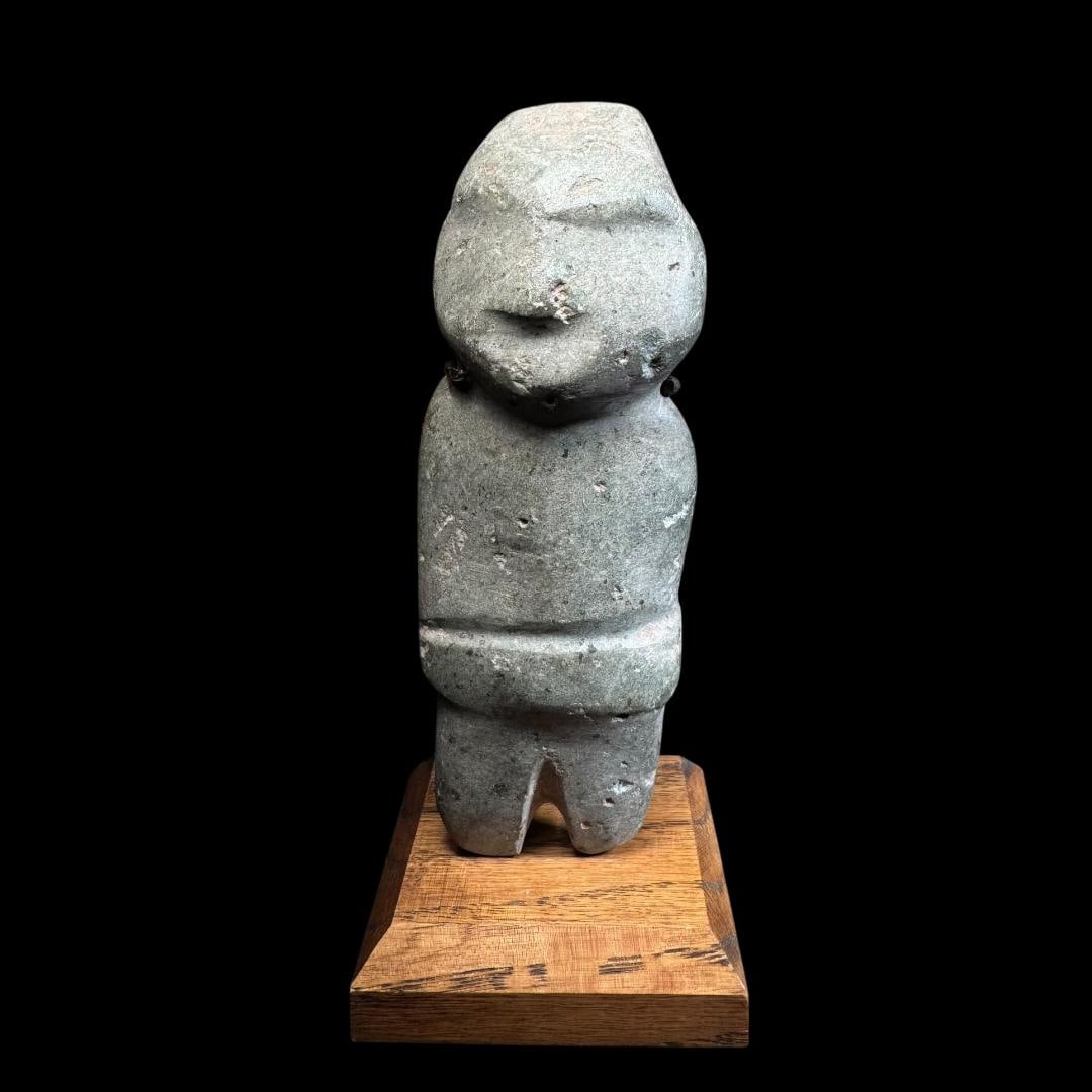 Pre-Columbian Mezcala Greenstone Figure: A Pre-Columbian Mezcala greenstone figure, originating from ancient Mesoamerica, Guerrero region, Mexico, dating to the Middle to Late Formative period, circa 300–100 BC. Carved from a dense green s
