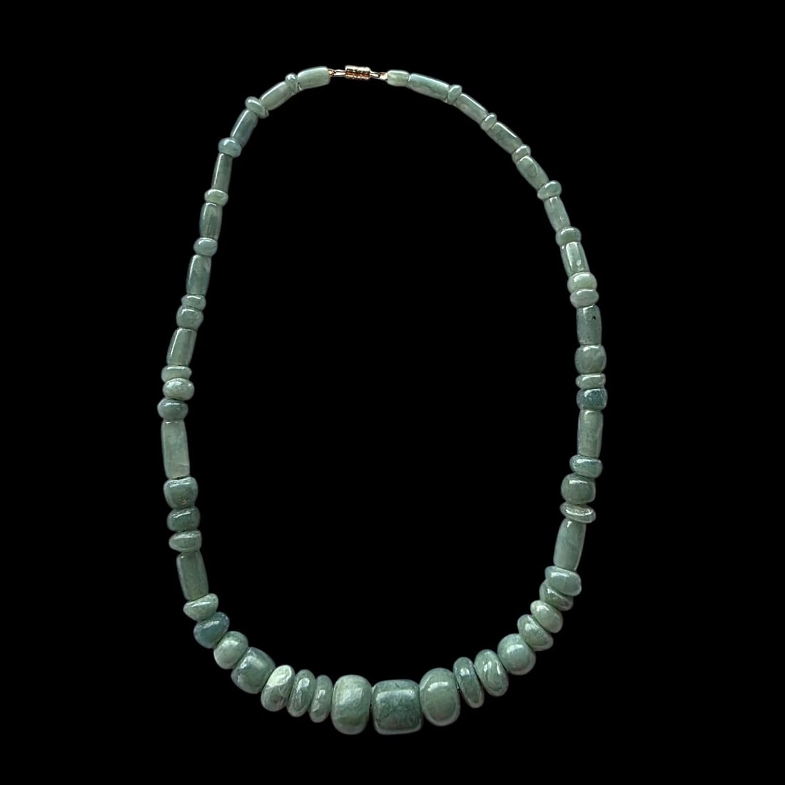 Guatemalan Type A Jadeite Jade Bead Necklace, Pre-Columbian Style, 19": This necklace is composed of natural Guatemalan Type A jadeite jade beads, hand-selected and arranged in a Pre-Columbian–inspired style. The strand features a graduated sequence of rounded and cylin