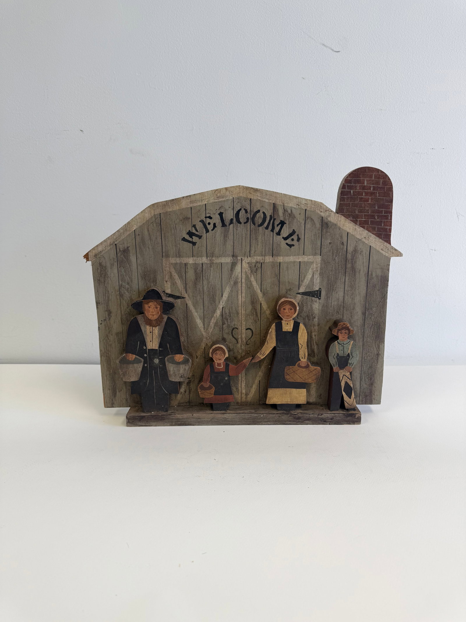Antique wooden Welcome Figurine: Antique wooden Welcome Figurine These are part of the estate sale and we do not have a COA. All lots offered in our auctions are sold strictly on an "AS IS" basis. Any descriptions regarding an