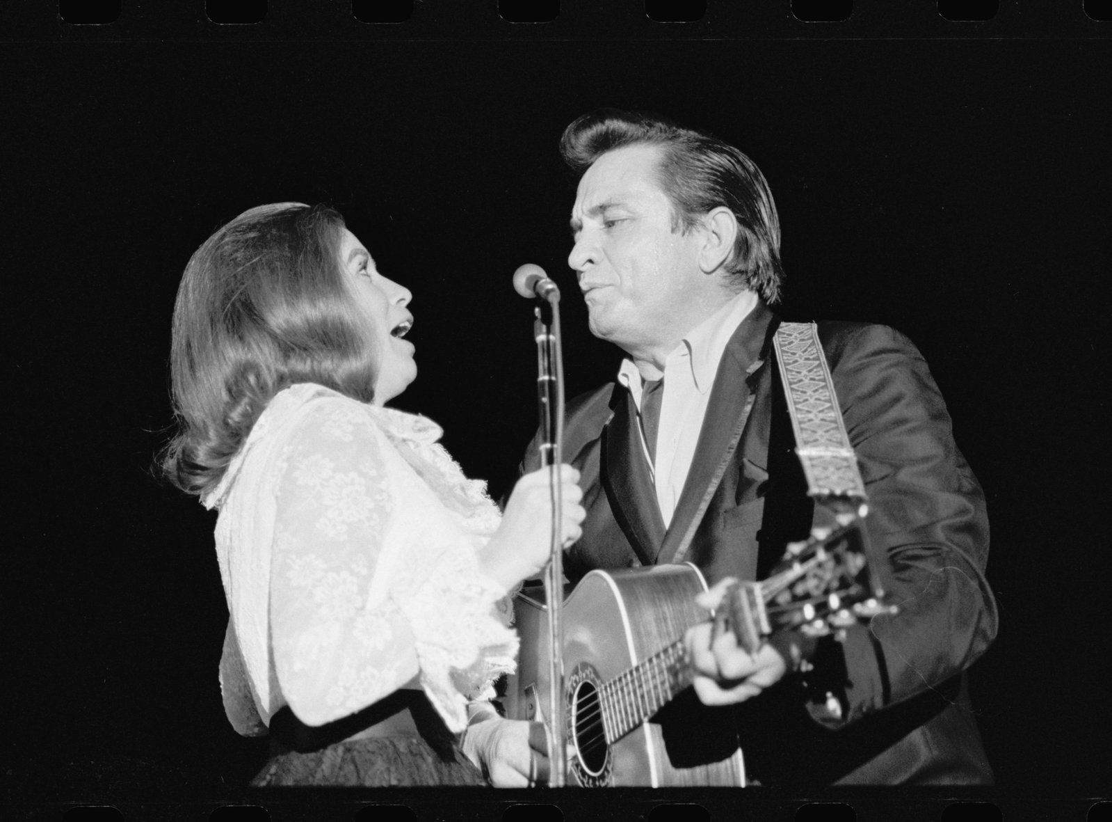 Johnny Cash, June Carter Cash, 1968' Photo Print: Johnny Cash, June Carter Cash, 1968 photo print on Kodak photo paper. Measures 16x20 inches. Framed. These are part of the estate sale and we do not have a COA. All lots offered in our auctions are so