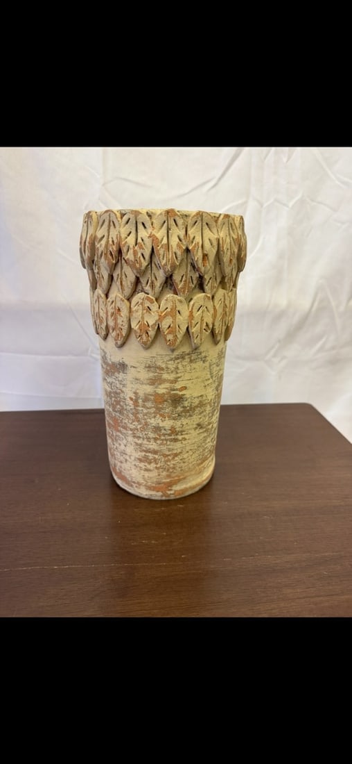 Vintage hand Built Terracotta Vase: Vintage Hand built terracotta vase. These are part of the estate sale and we do not have a COA. All lots offered in our auctions are sold strictly on an "AS IS" basis. Any descriptions regarding an it