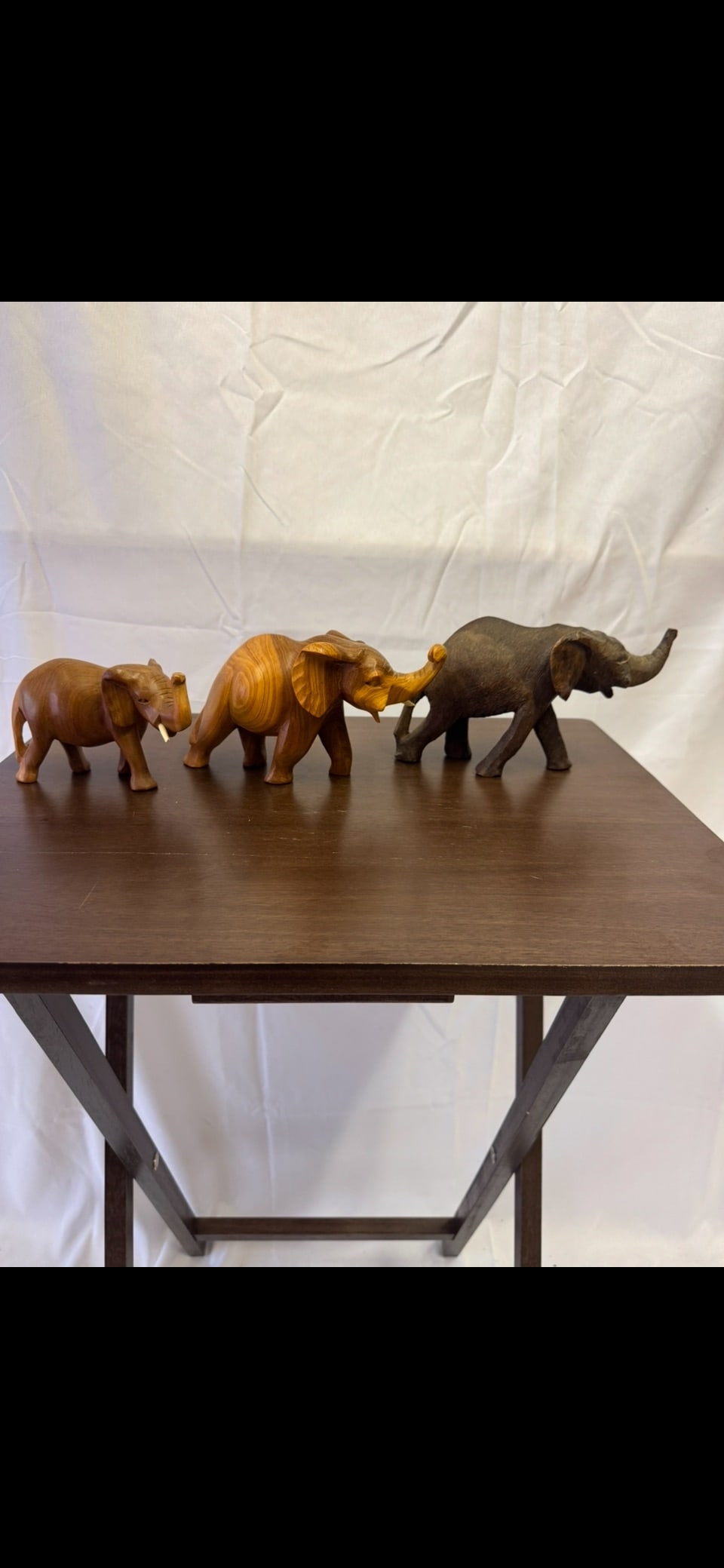 Antique Hand Carved, African Wooden Elephants (set of 3): 3 hand carved african wooden elephants. These are part of the estate sale and we do not have a COA. All lots offered in our auctions are sold strictly on an "AS IS" basis. Any descriptions regarding a