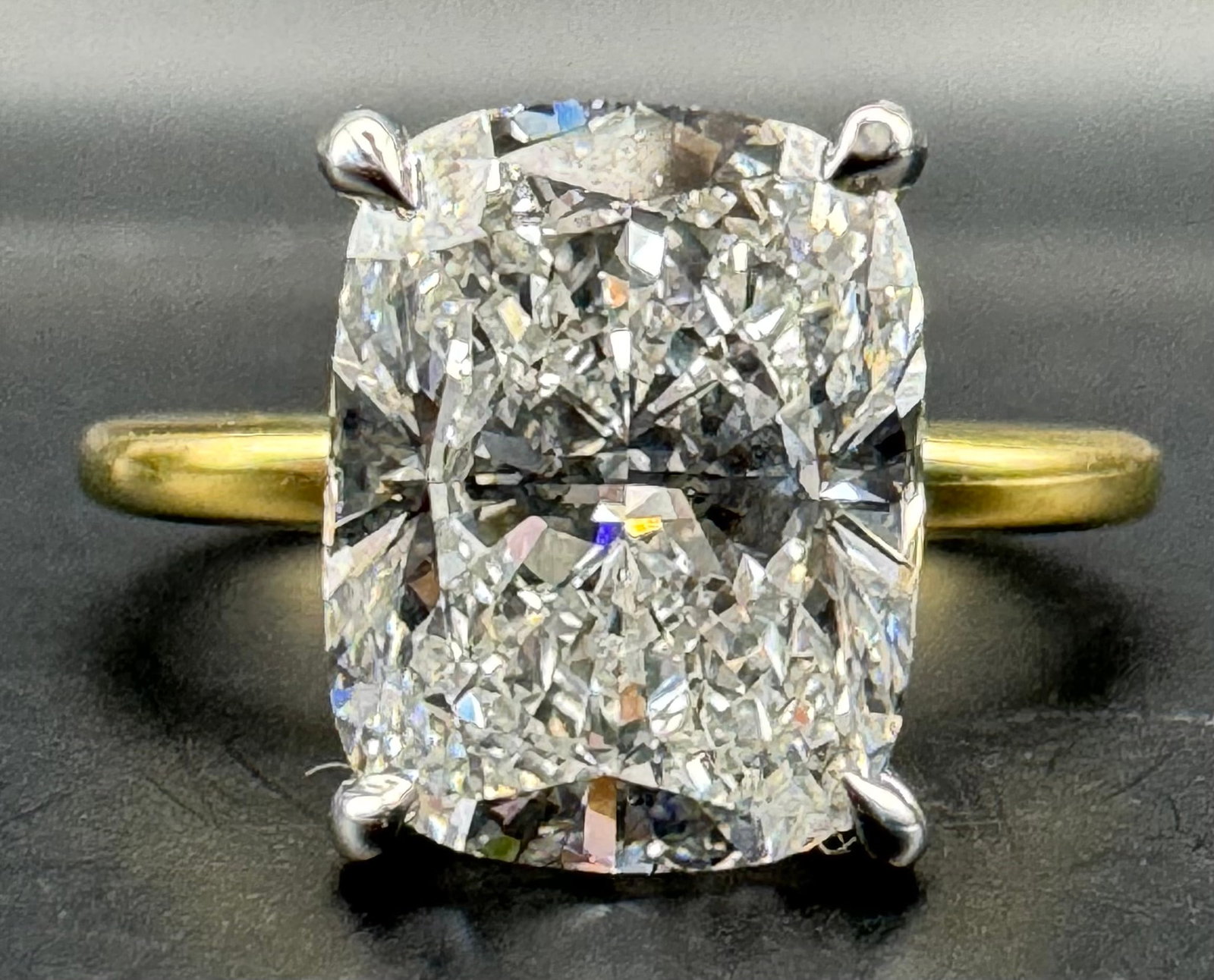 18K TWO-TONE GOLD CUSHION CUT LAB DIAMOND RING 4.13CT: 18K two-tone gold ring features 4.13 TW carats of cushion cut lab-grown diamond weighing 4.03 carats at its center, IGI certified (LG652465162), set in 4 prong setting. Side stones feature round brill