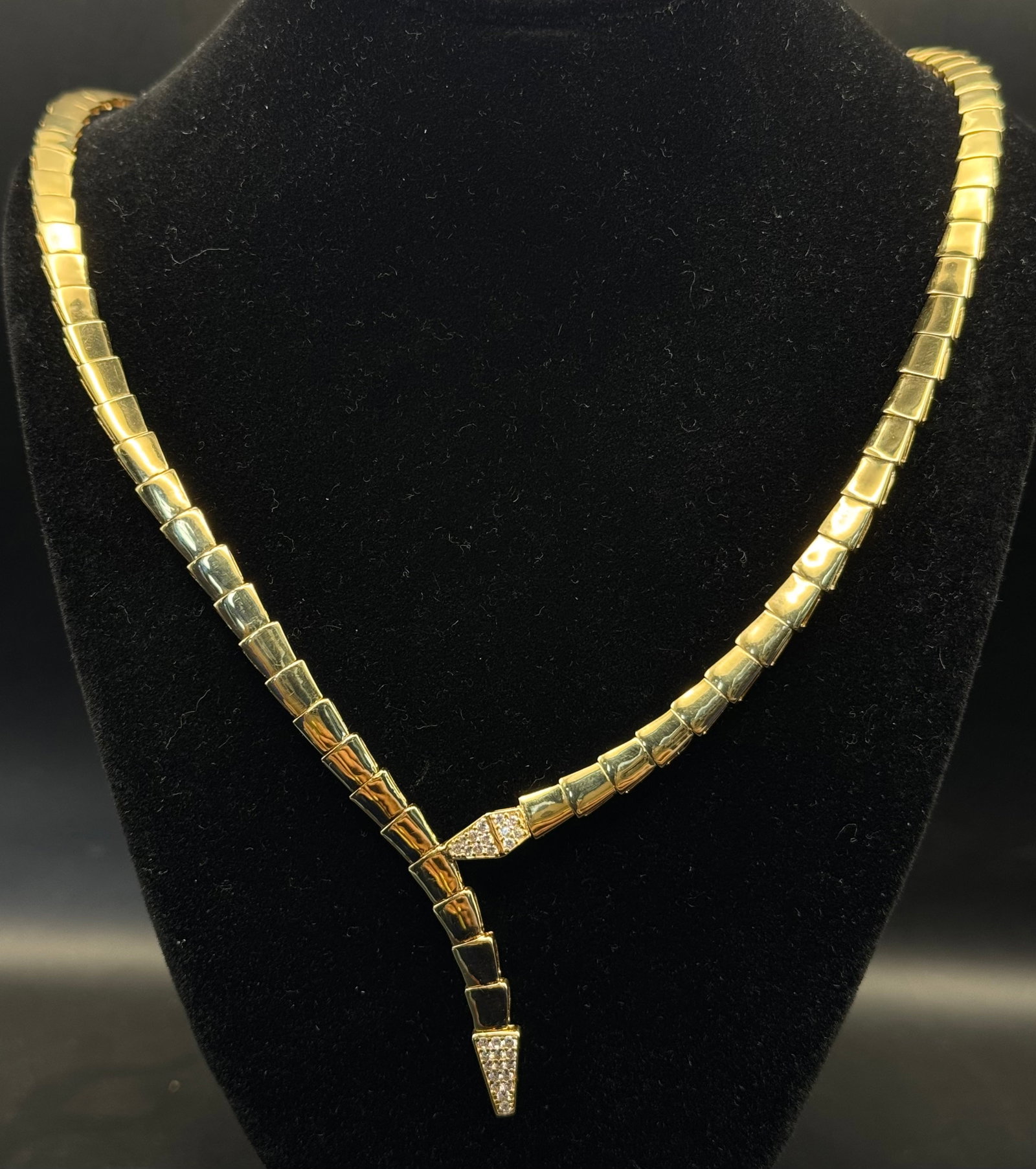18K GOLD SERPENTI VIPER INSPIRED NECKLACE EARRINGS SET SWAROVSKI: 18K gold Serpenti Viper inspired necklace and earrings set featuring Swarovski crystals throughout. Total net weight 28.3 grams including necklace and pair of earrings. Stamped 18K. New condition. Ple
