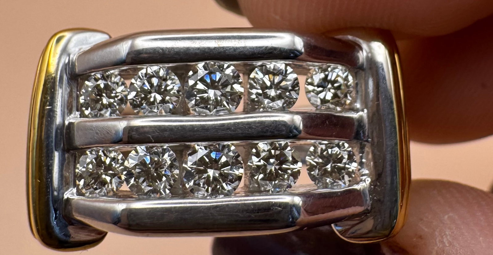 14K TWO-TONE GOLD ROUND BRILLIANT DIAMOND TWO ROW RING 1.50CT: 14K two-tone gold ring featuring two rows of 10 round brilliant cut earth-mined diamonds totaling 1.50ct, F-G color, VS1 clarity, set in invisible setting. Total ring weight 14.5 grams, size 11, resiz