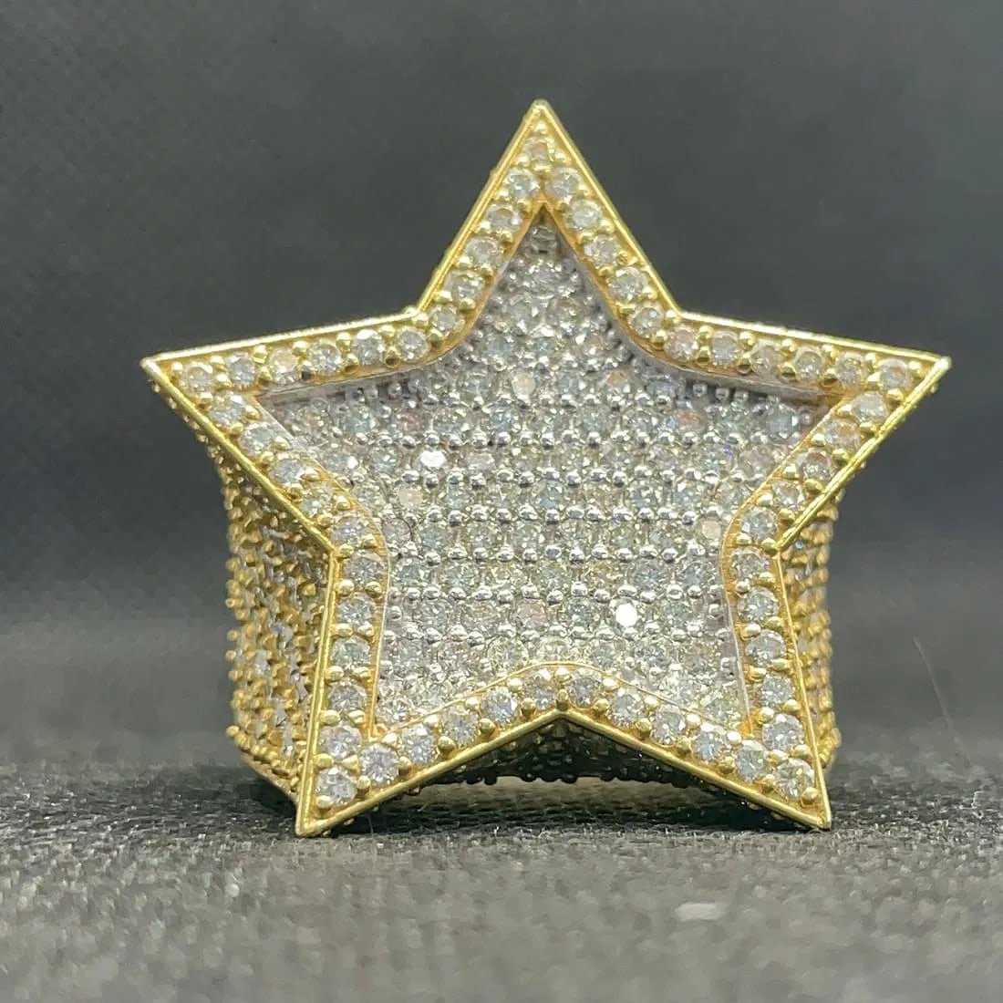 14K YELLOW GOLD SHOOTING STAR EARTH-MINED DIAMOND PAVE RING 12CT: 14K yellow gold shooting star ring featuring 12.00ct round brilliant cut earth-mined diamonds, F-G color, VS2 clarity, hand-set in pave setting throughout. Unique 3D star design fully frosted with dia
