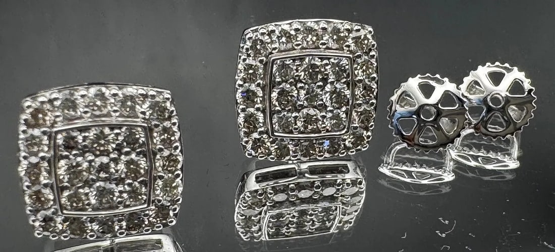 14K WHITE GOLD ROUND BRILLIANT DIAMOND CLUSTER STUD EARRINGS 1.50CT: 14K white gold diamond cluster stud earrings featuring 1.50ct round brilliant cut earth-mined diamonds, G color, VS1 clarity, prong set. 26 diamonds per earring. Screw-back closure. Total weight 3.1 g