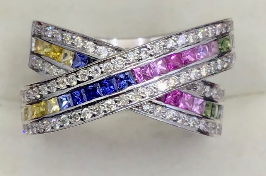 14k White Gold 1.50ctw Princess-Cut Rainbow Sapphire & 0.75ctw Diamond Band (10g): This dazzling 14k white gold band is a striking masterwork of color and light. The center row features a vibrant gradient of natural princess-cut sapphires totaling 1.50 carats, creating a seamless ra